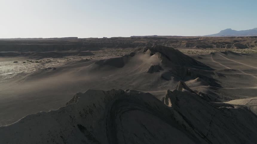 The bright sun shines on the desert