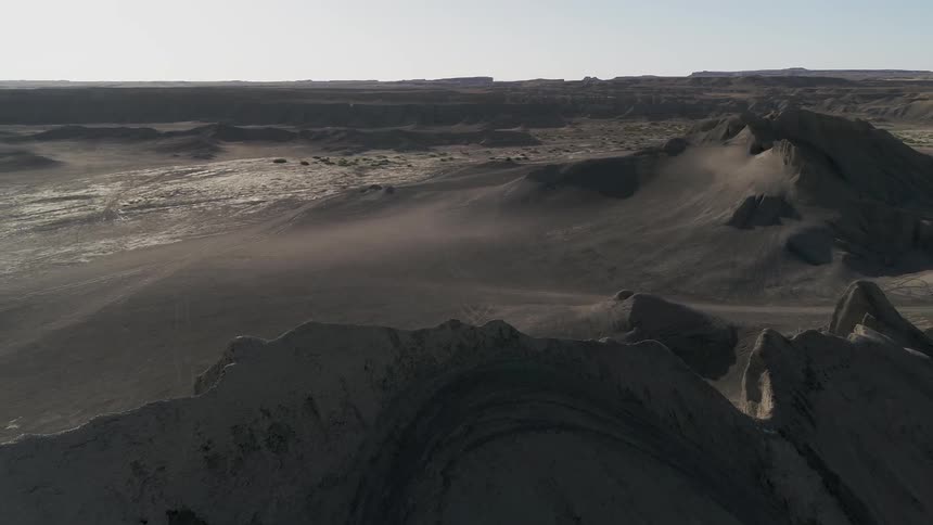 The dark hills ahead are in the shadows