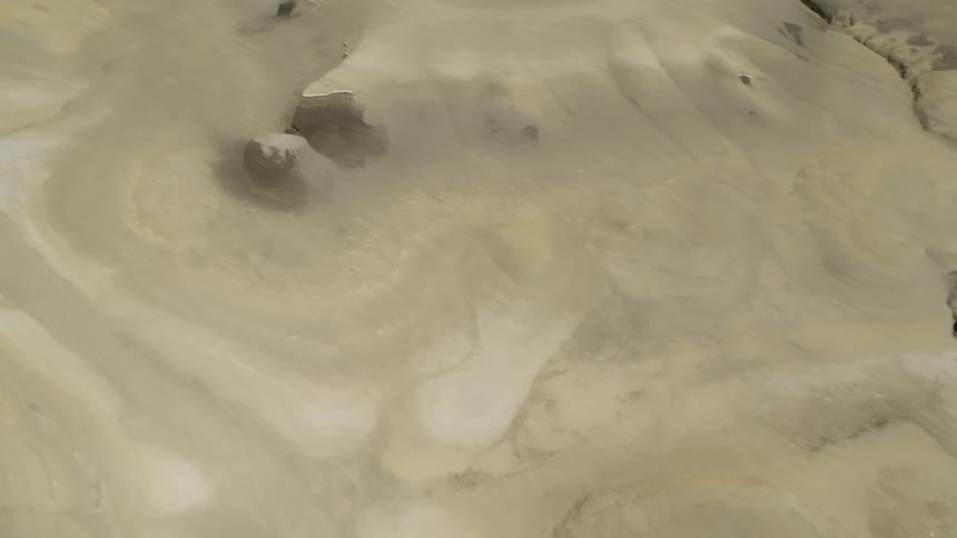 Mountain range covered in dry earth