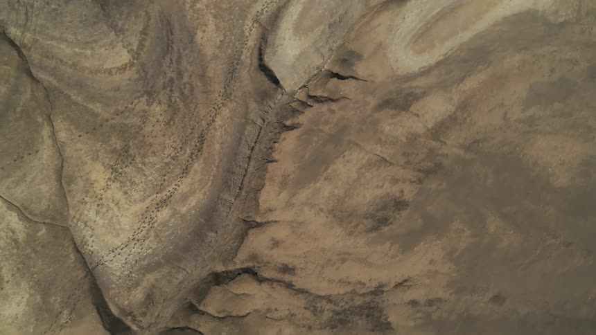 Mountain range covered in dry earth