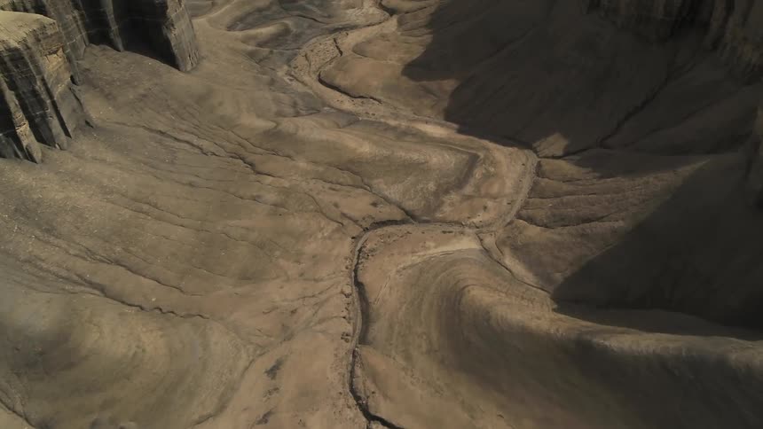 Cracks in the land near the flat hills