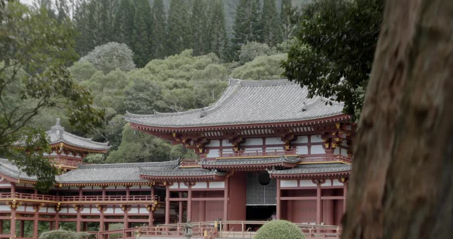 Oriental building sits near the trees