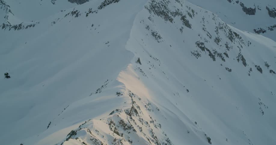Snow covered ridges and mountain slopes