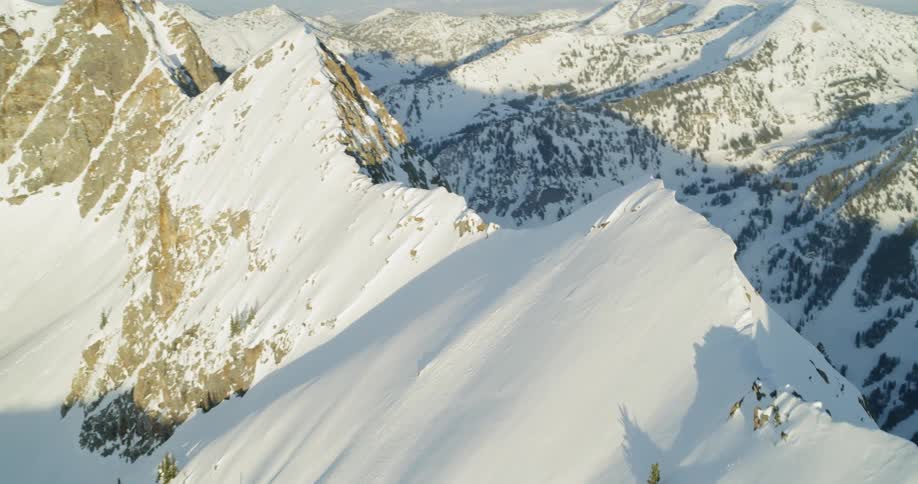 Snow covers mountains in the wilderness