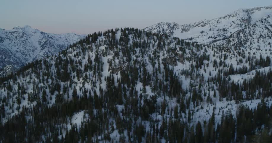 Snow covered mountains on a cloudy day