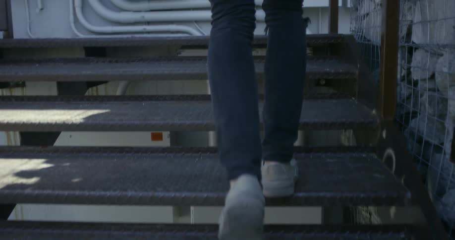 Someone is walking up the stairs