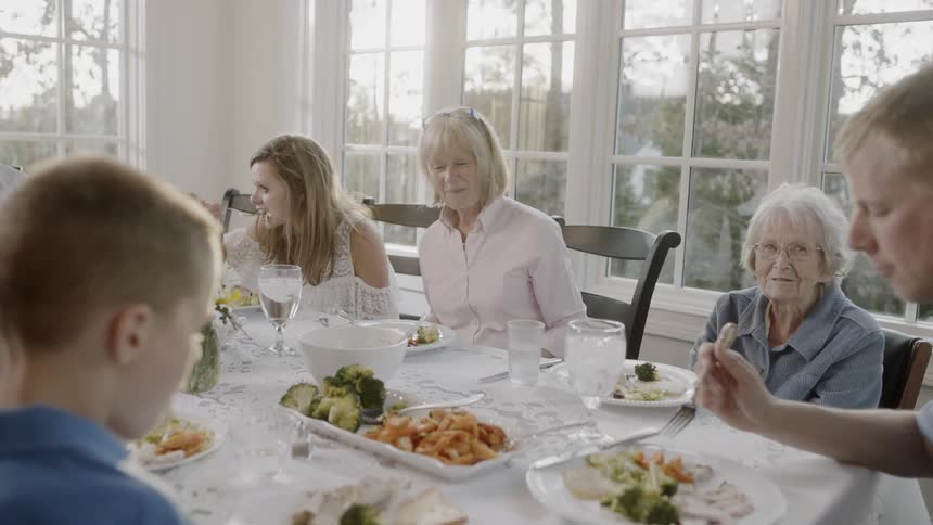Family eats at a dining table