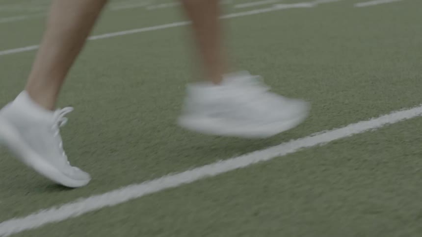 Man runs on the football field