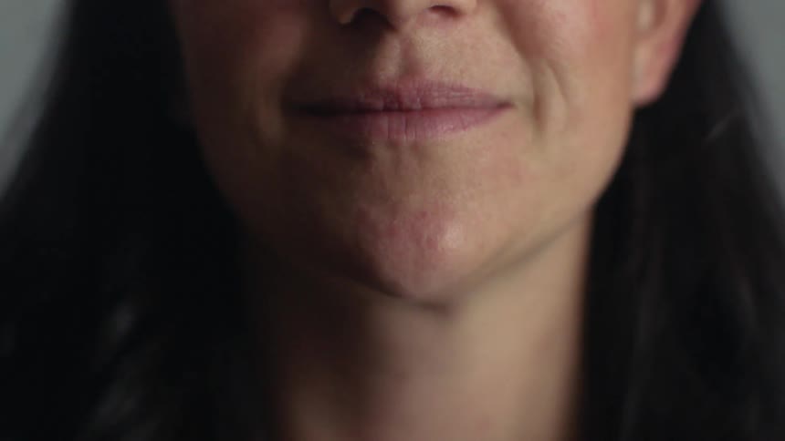 Woman is smiling