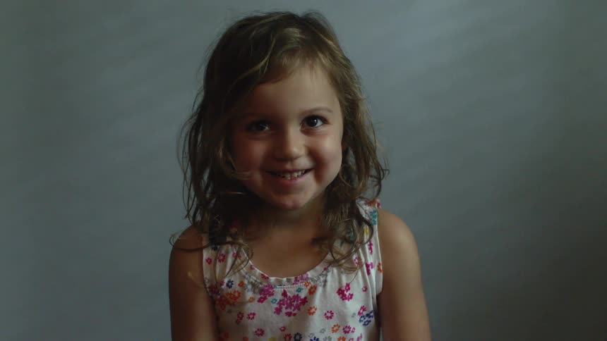 Little girl is laughing and smiling
