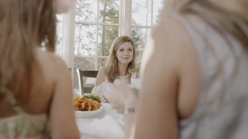 Family eats at a dining table