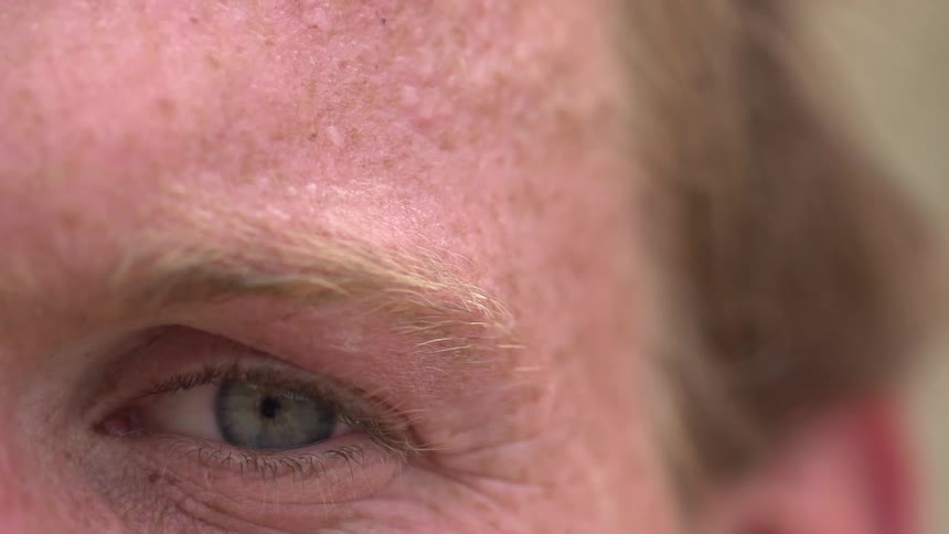A closeup of a mans eye