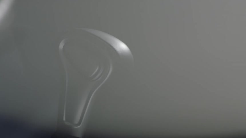 Light shines over a vehicle shifter