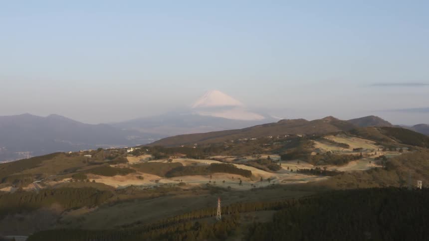 Hilly grassy plains on a clear day