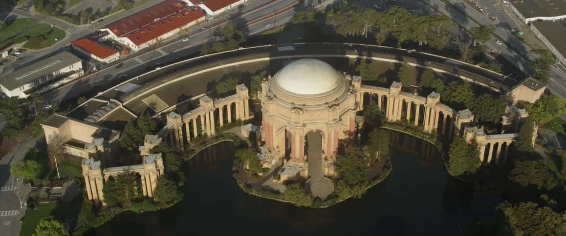 The building is lined with water near the dome