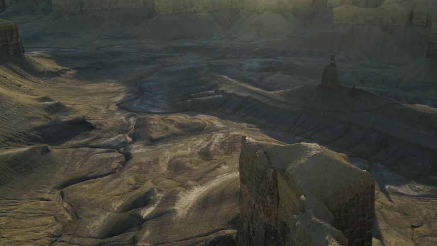 Rock formations stand in a desert