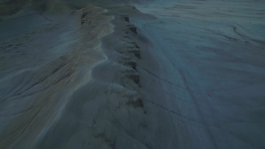 Sandy hilly desert at sunset