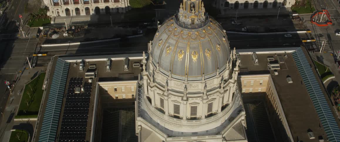 The building has a large dome in the middle