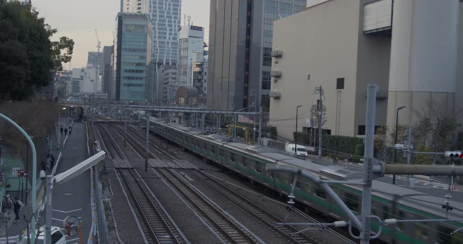 A passenger train travels through a city