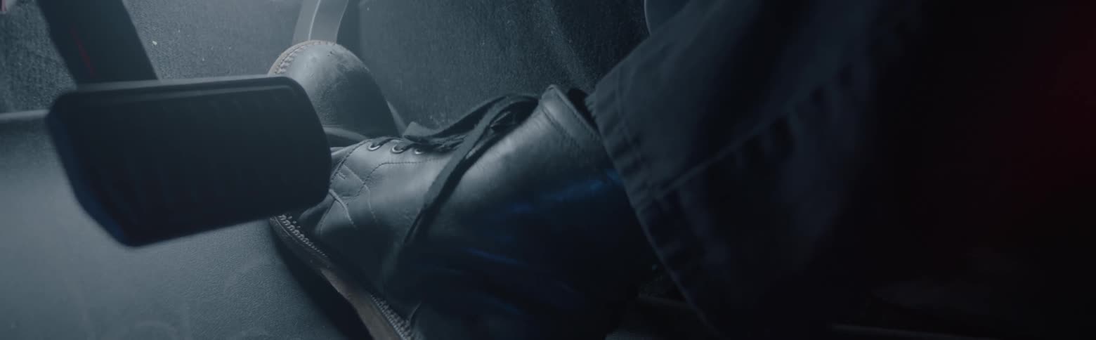 A man presses on the gas pedal