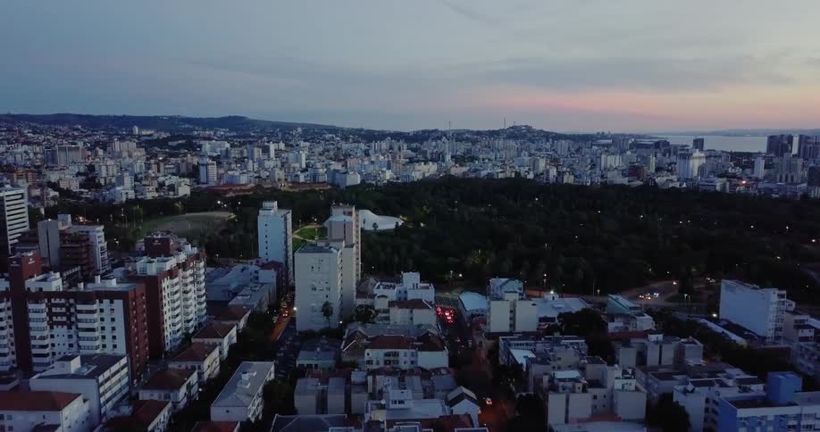 Rooftops and building of a city at sunset