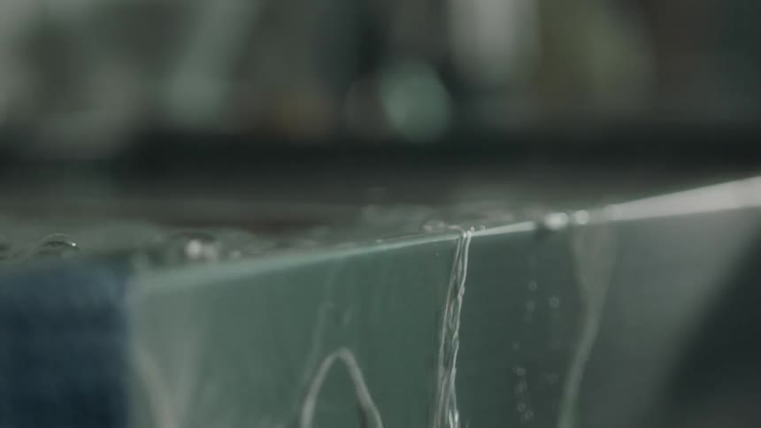 Water falls off the side of the bathtub