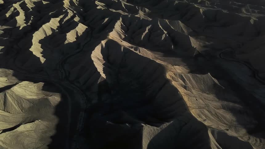 Shadows are cast on the rocks