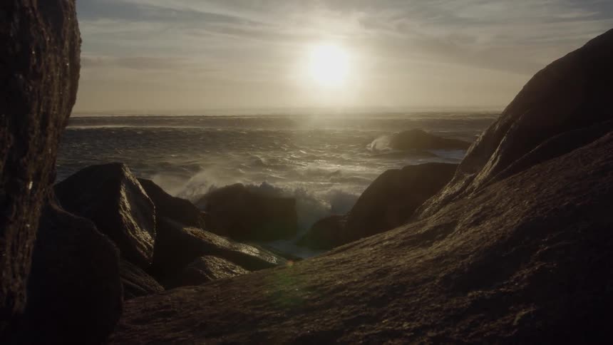 Sun shines over a large body of water