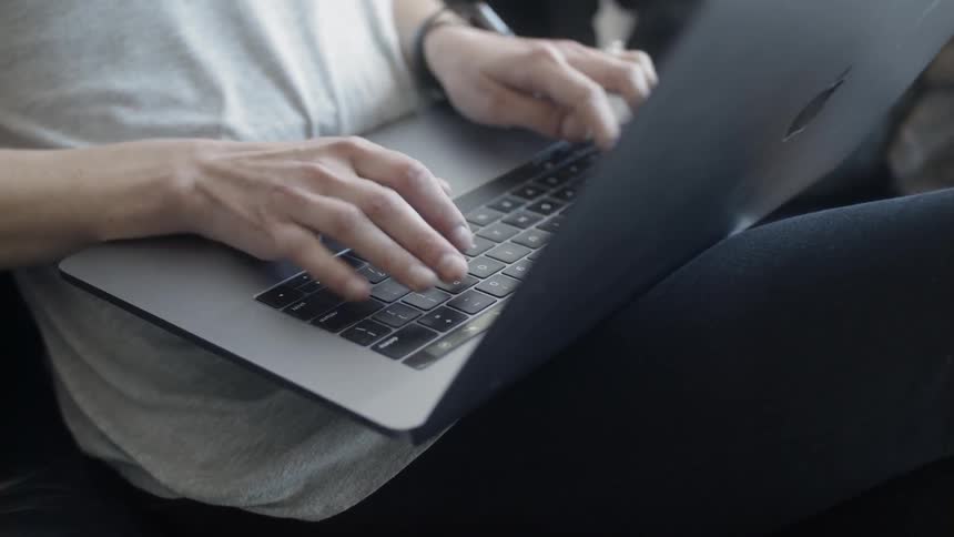 A man uses a laptop