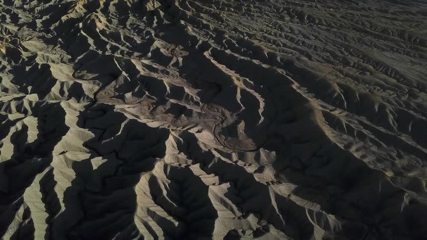 Rock formations and ridges in a barren landscape