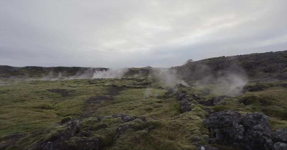 Steam rises from hot springs