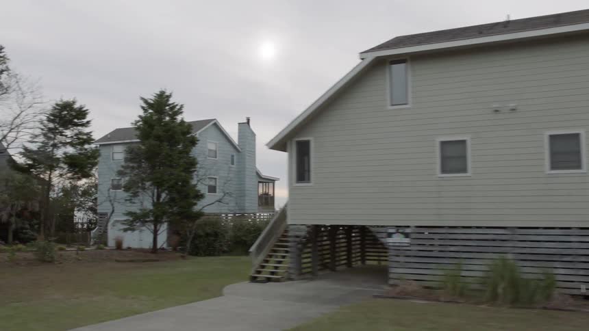 Houses in a country setting on a cloudy day