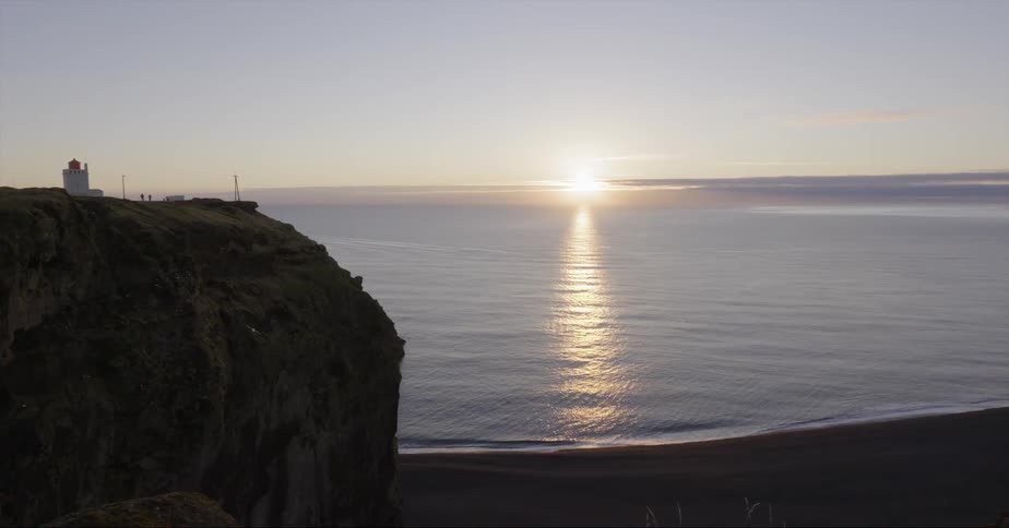The sun sets over an ocean