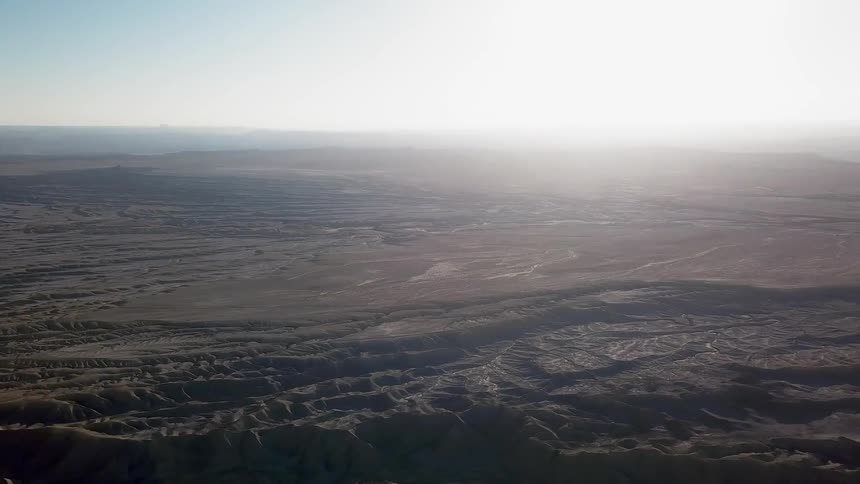 Sun shines brightly over the barren land
