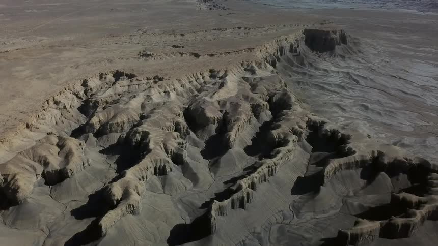 Small hills and formations cover the landscape