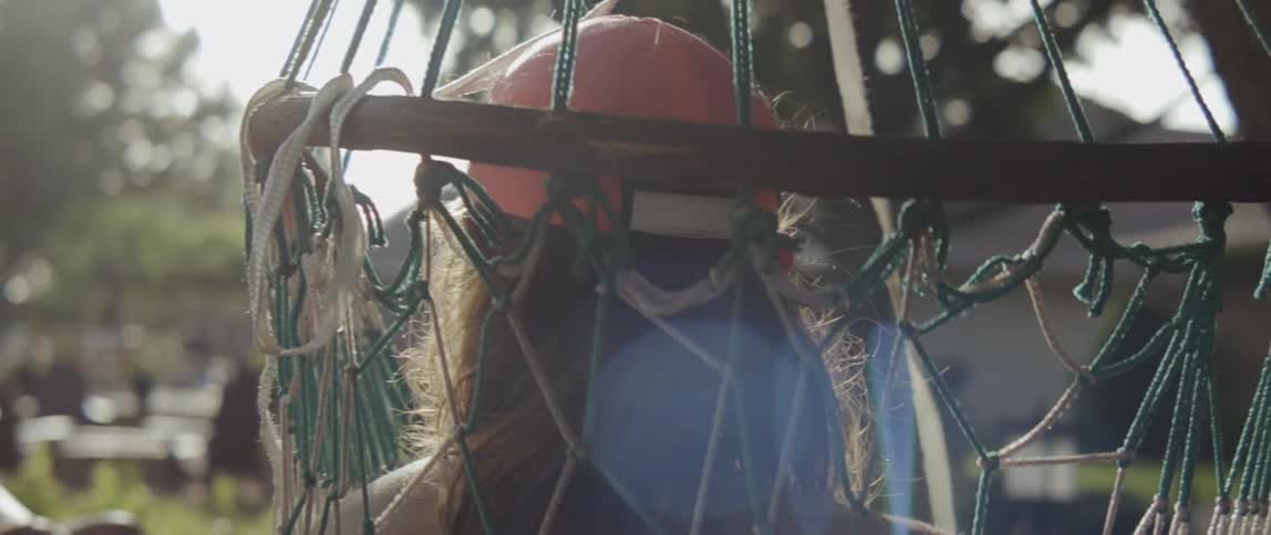 A woman rests in a hammock