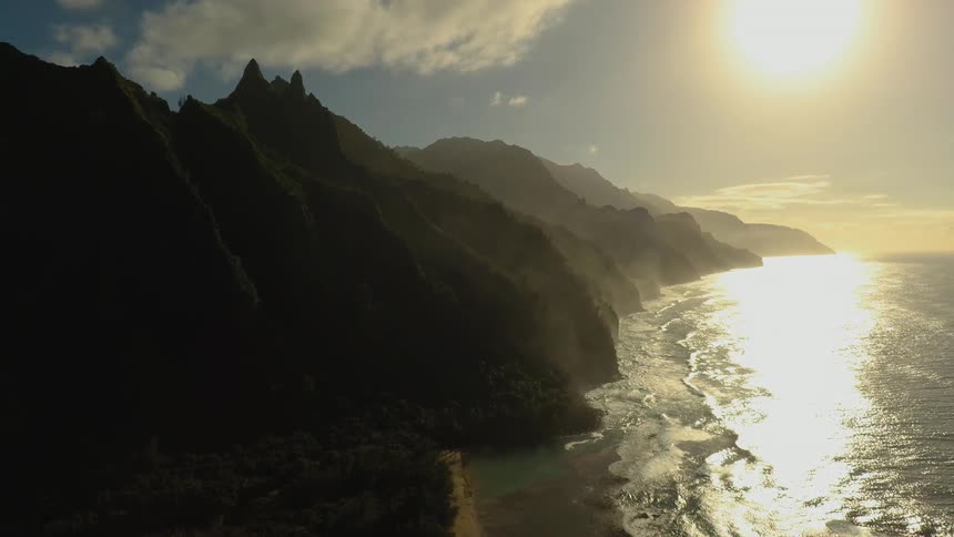 The sun shines on the flowing ocean waters