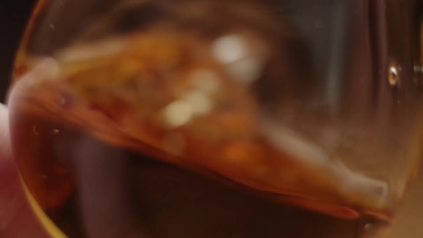 Liquid swirls around in a glass