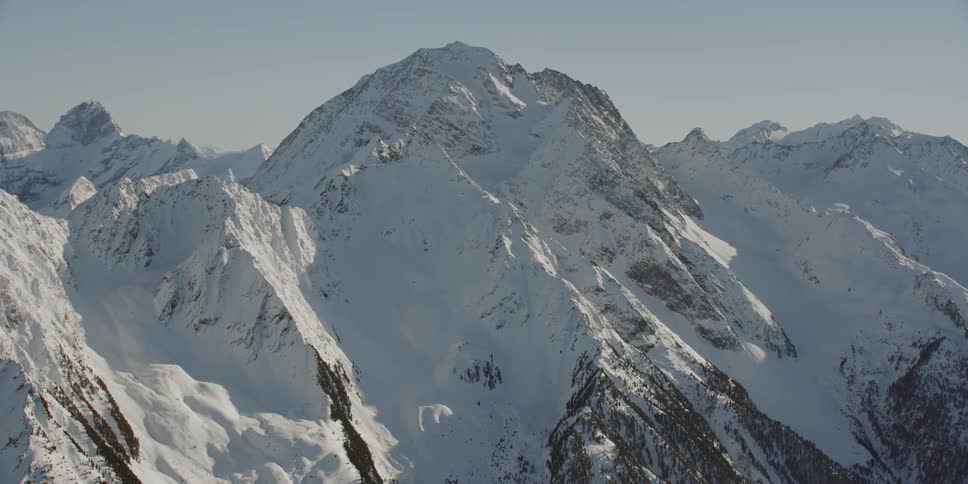 Sun shines down over the snow covered Mt Habicht
