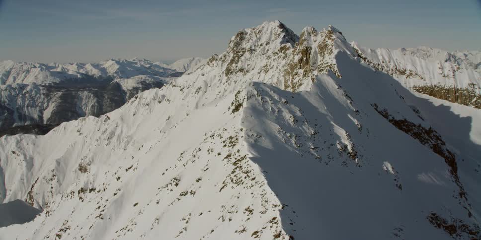 Snow covers the mountain landscape