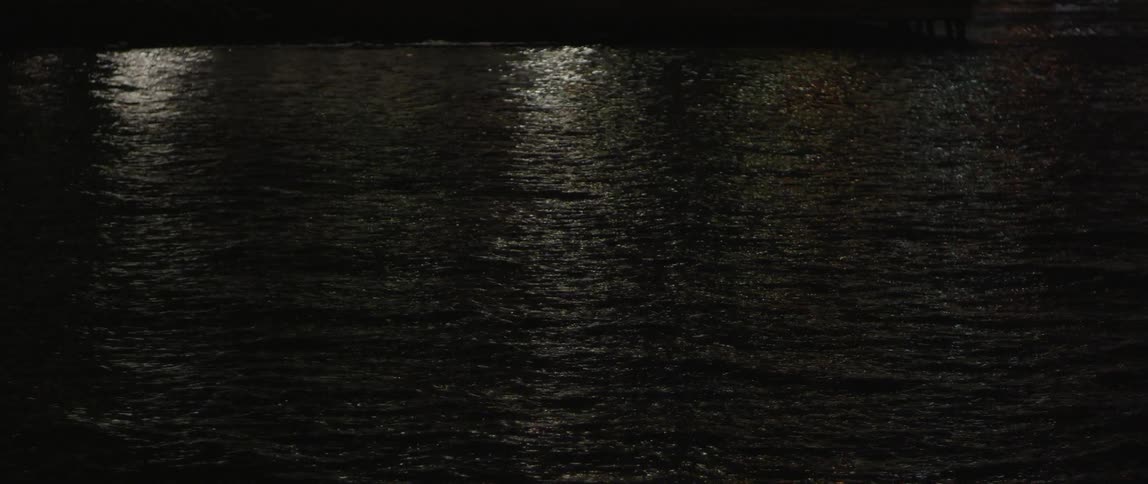 Light reflecting off the ocean at night