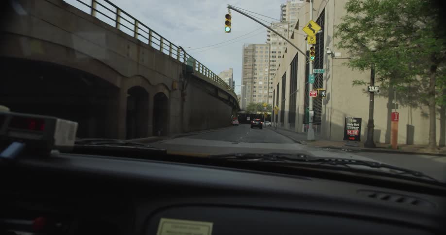 Vehicle driving with buildings on their right side