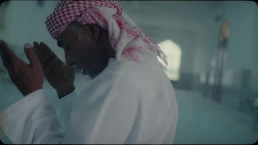 A man prays inside of a mosque