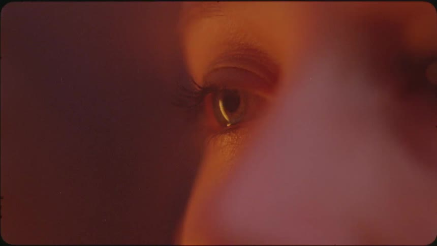 The light is flashing on the person's face