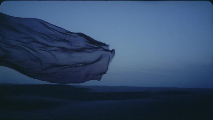 The fabric blows in the wind at dawn