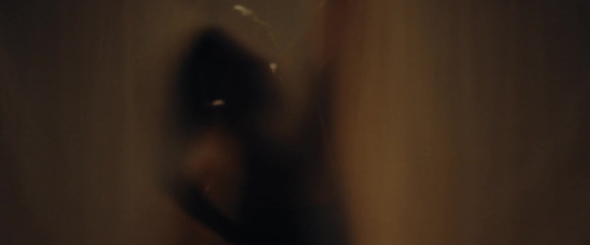The blurred image of a person stretching