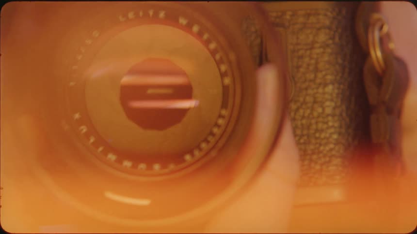 The lens opens and closes on the camera