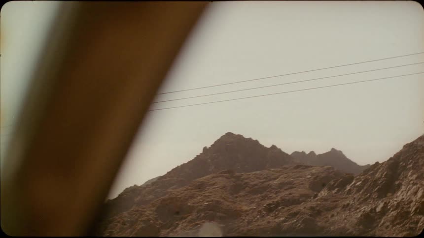 A car travels down the road