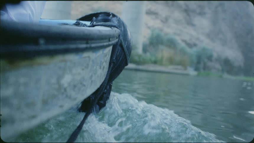 The boat is moving in the water