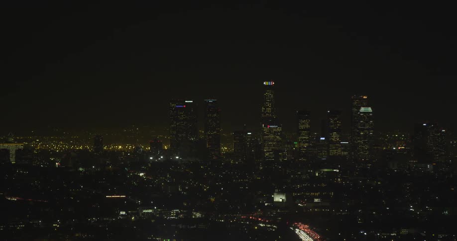 City skyscrapers tower in the skyline at night